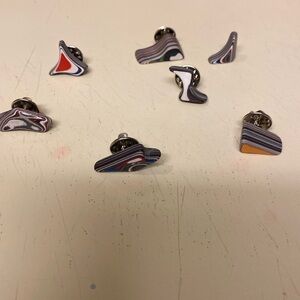 7 fordite pins/tie tacks